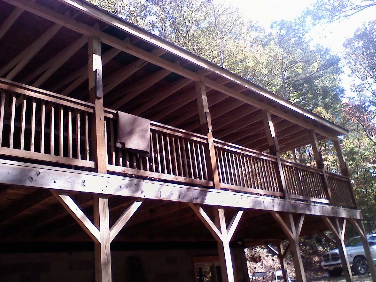 Timber framing under a new elevated porch and deck — Roof Leak Repair in Portage Des Sioux by Roofing Brothers